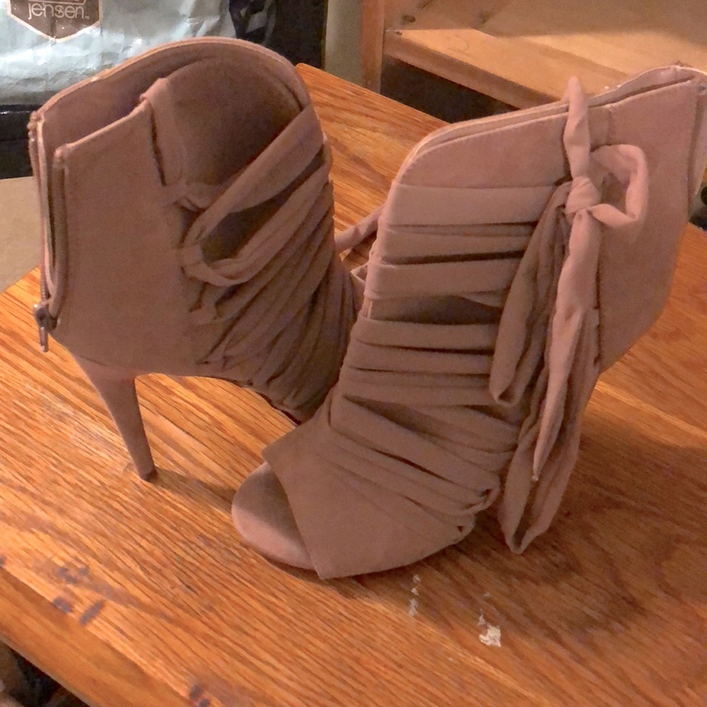 Blush pink suede open toe heels with tie up.